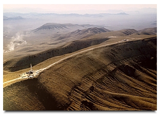 The crest of Yucca Mountain - by DOE
